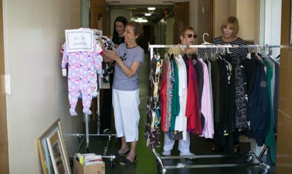 Volunteer sorting clothing